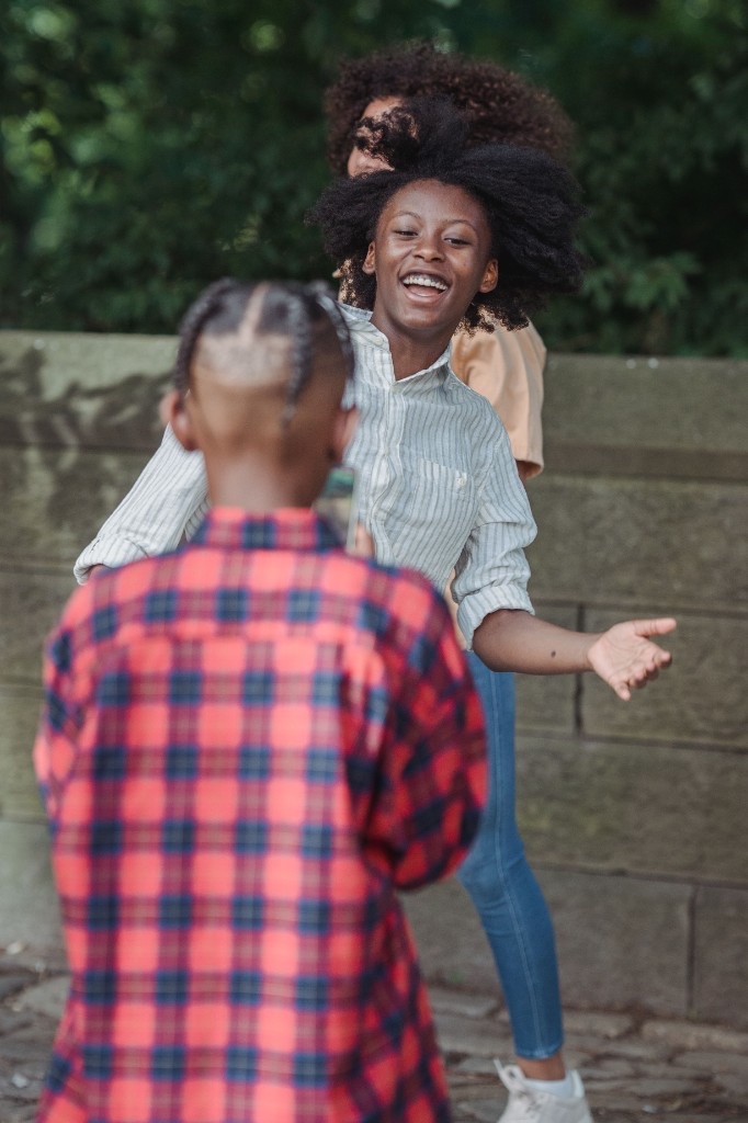 Child smiling outdoors